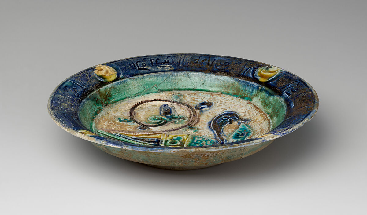 Dish, Stonepaste; carved, incised, polychrome painted under a transparent glaze (Laqabi ware)