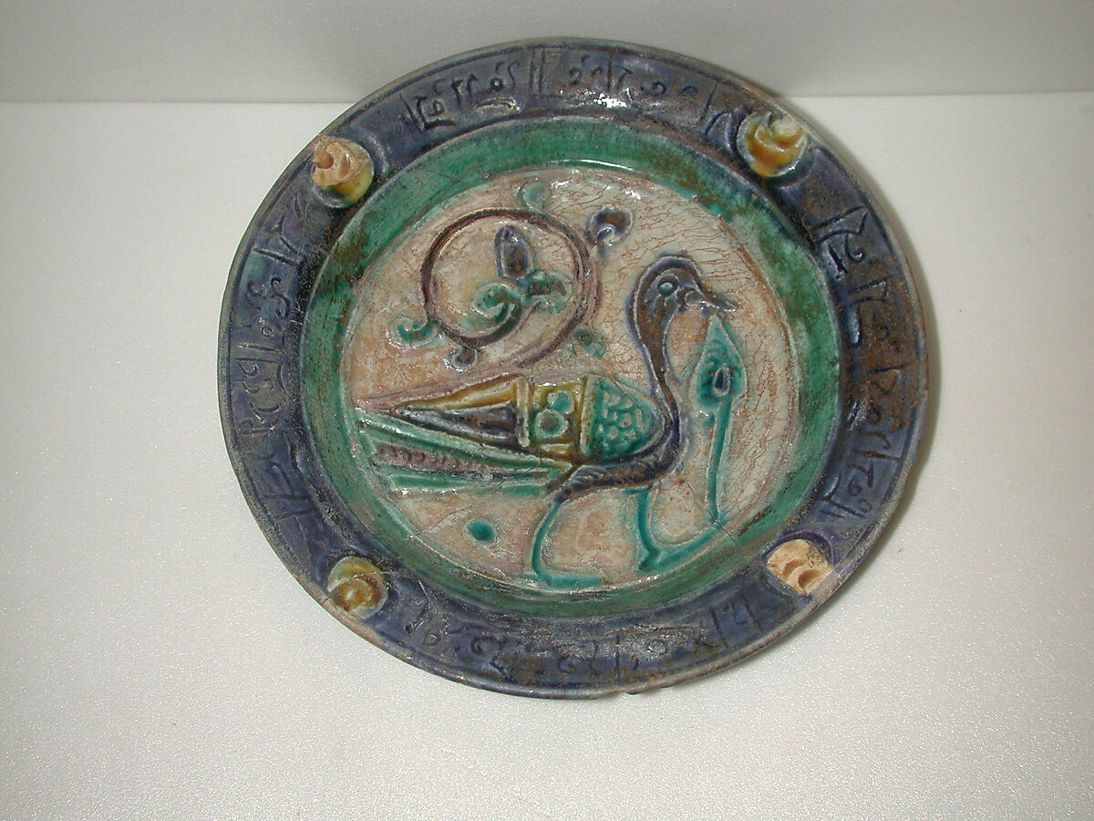 Dish, Stonepaste; carved, incised, polychrome painted under a transparent glaze (Laqabi ware)