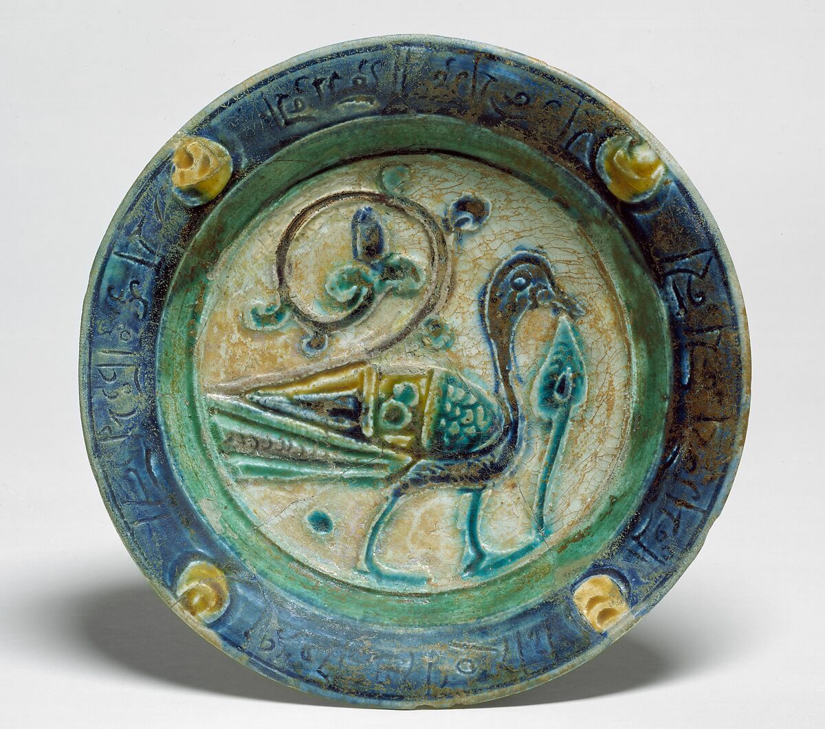 Dish, Stonepaste; carved, incised, polychrome painted under a transparent glaze (Laqabi ware)