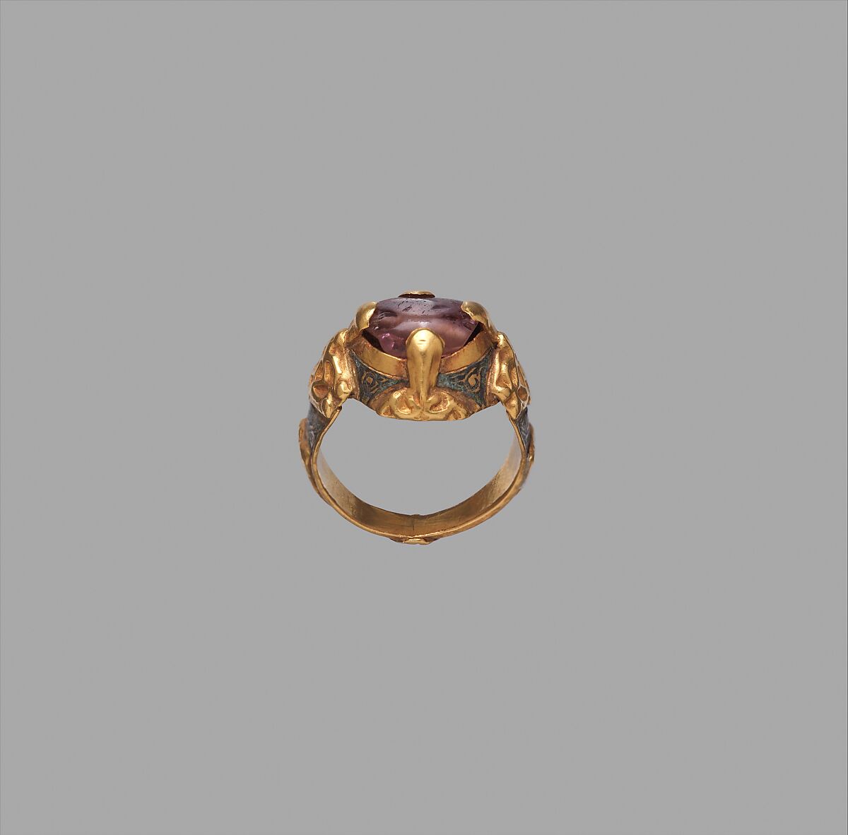 Ring, Gold; cast and fabricated from sheet, decorated with bitumen-highlighted incising, set with tourmaline bead 