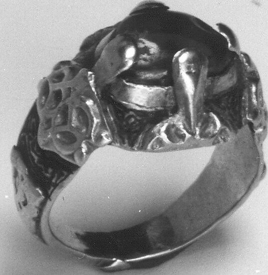 Ring, Gold; cast and fabricated from sheet, decorated with bitumen-highlighted incising, set with tourmaline bead