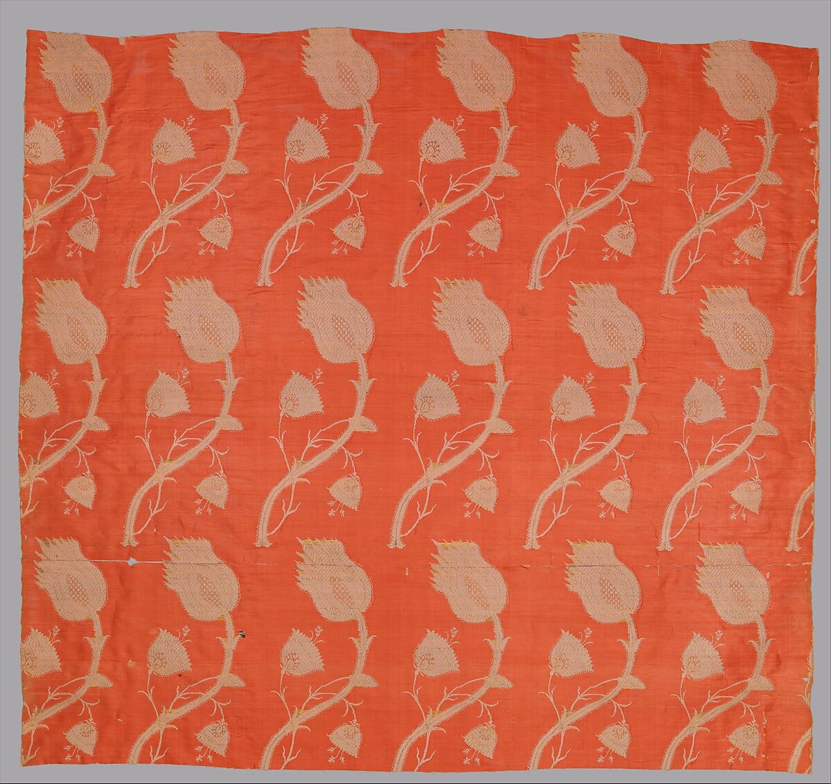 Textile Fragment with a Repeating Pattern of Interlocked Tulips and Poppies, Silk, metal wrapped thread; plain weave, brocaded