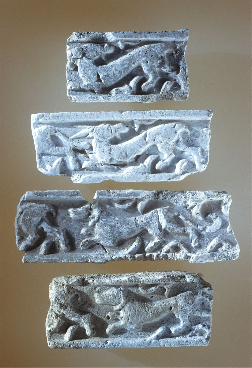 Fragments of a Frieze with Chasing Animals, Stucco; molded and carved