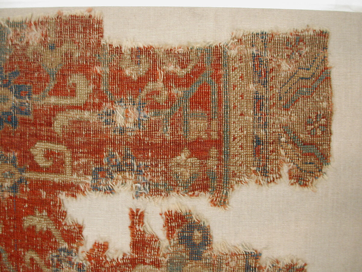 Carpet with Chintimani Border and Lotus Design, Animal hair (warp and weft), wool (pile); asymmetrically knotted pile