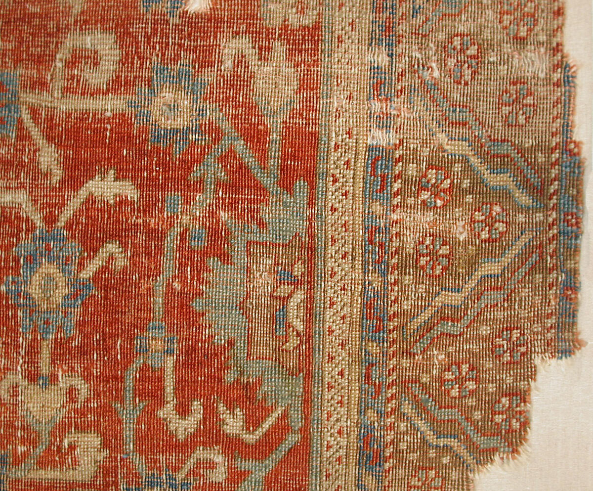 Carpet with Chintimani Border and Lotus Design, Animal hair (warp and weft), wool (pile); asymmetrically knotted pile