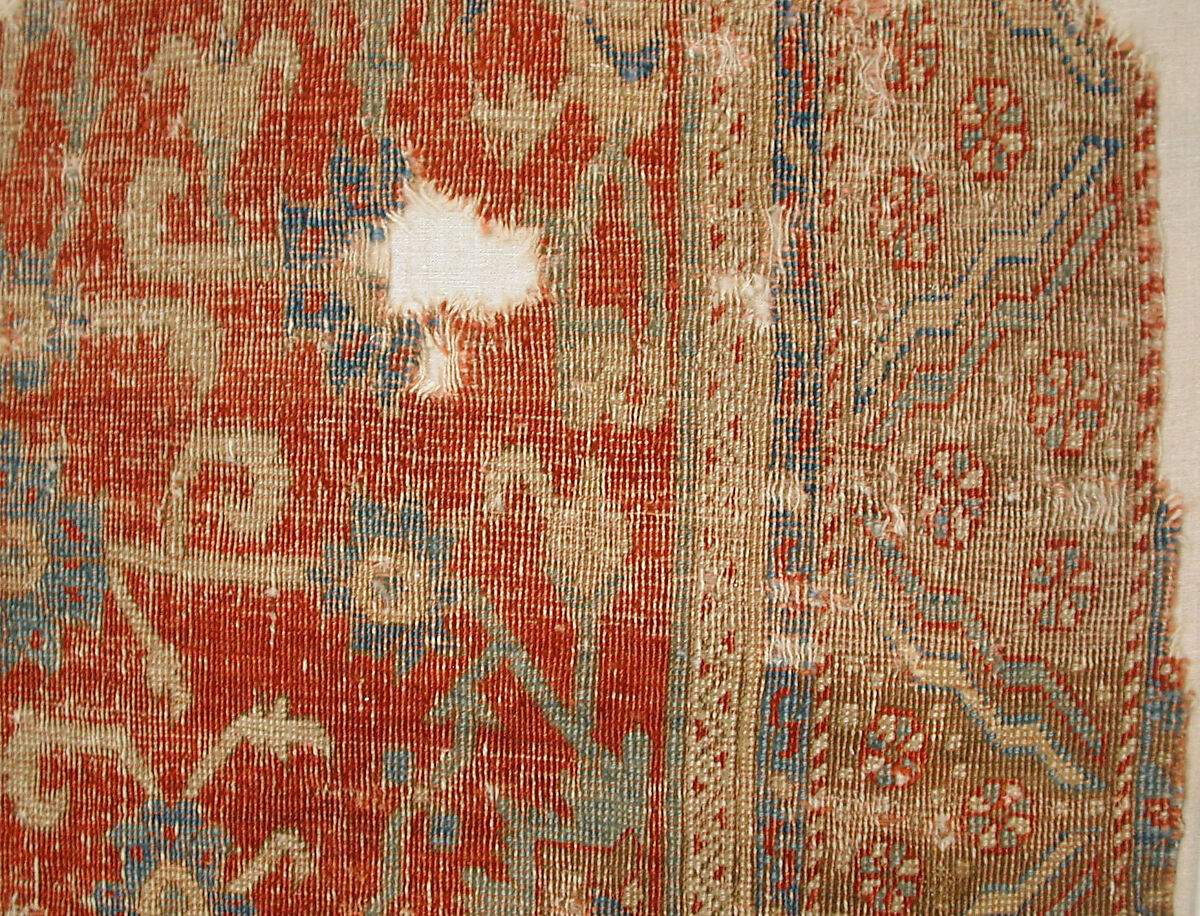 Carpet with Chintimani Border and Lotus Design, Animal hair (warp and weft), wool (pile); asymmetrically knotted pile