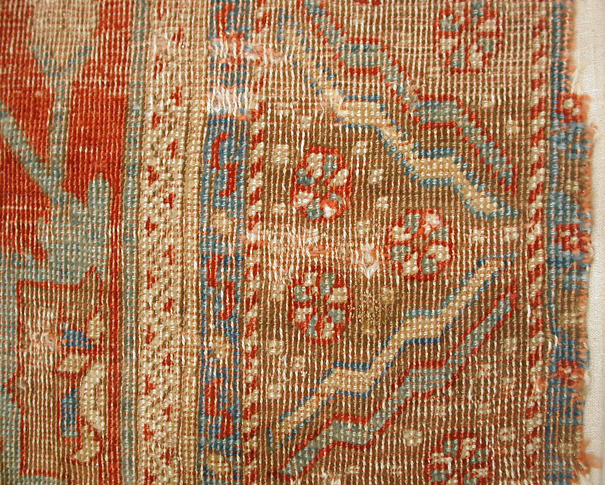 Carpet with Chintimani Border and Lotus Design, Animal hair (warp and weft), wool (pile); asymmetrically knotted pile