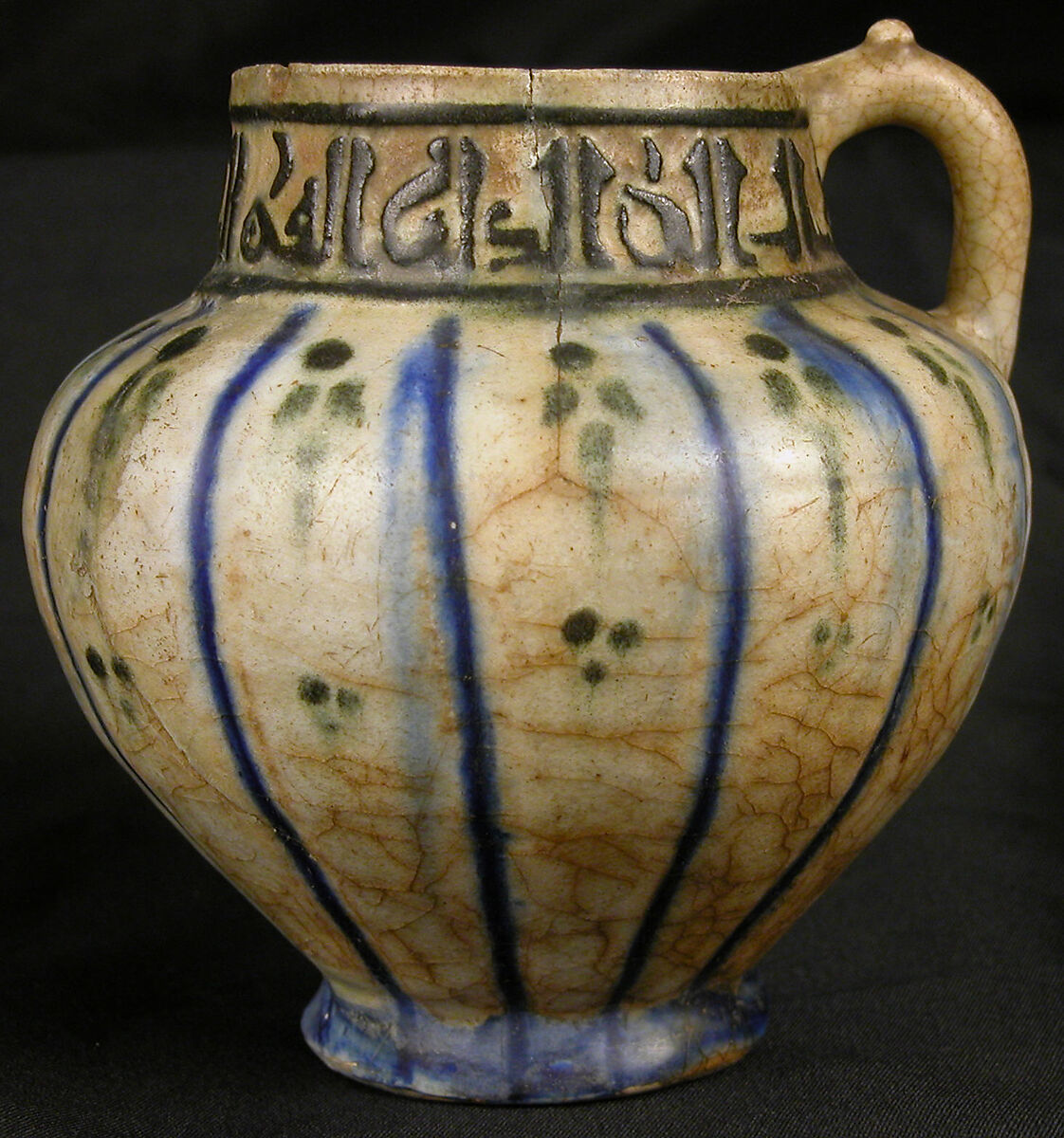 Ewer, Stoneware; underglaze painted and carved through black slip under colorless glaze 