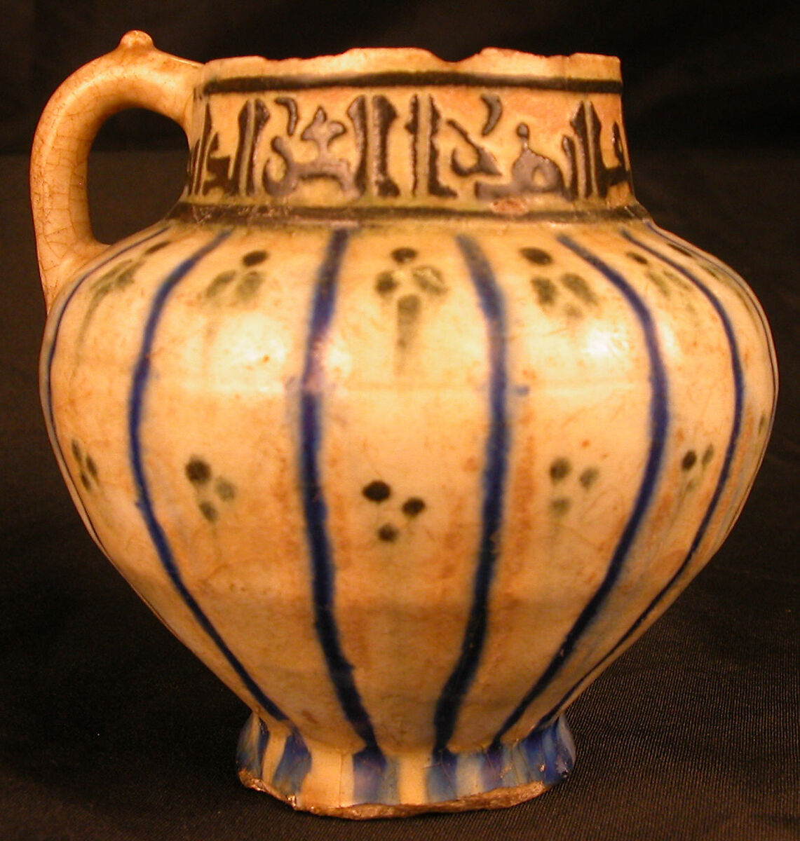 Ewer, Stoneware; underglaze painted and carved through black slip under colorless glaze