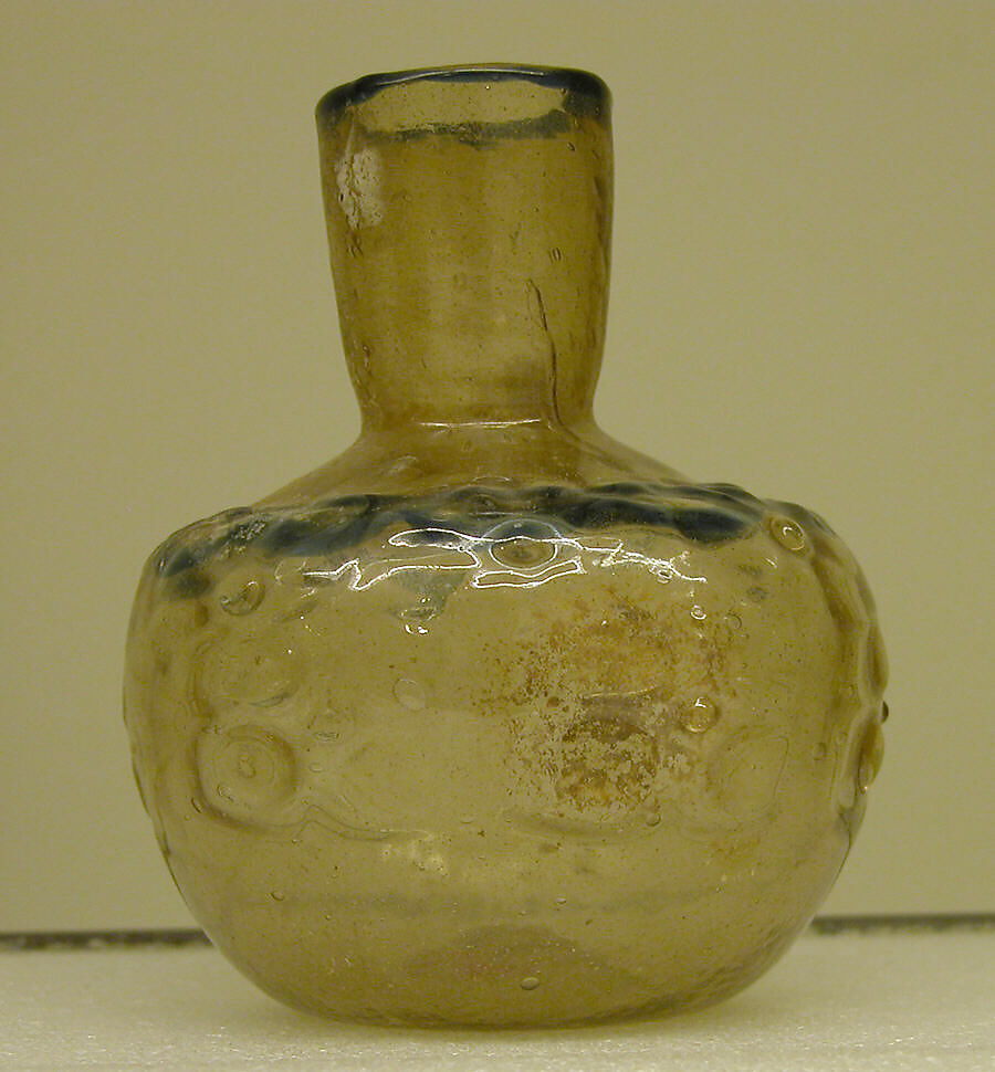 Short-Necked bottle, Glass, colorless with brown tinge; blown, impressed with tongs, applied blue rim and decoration