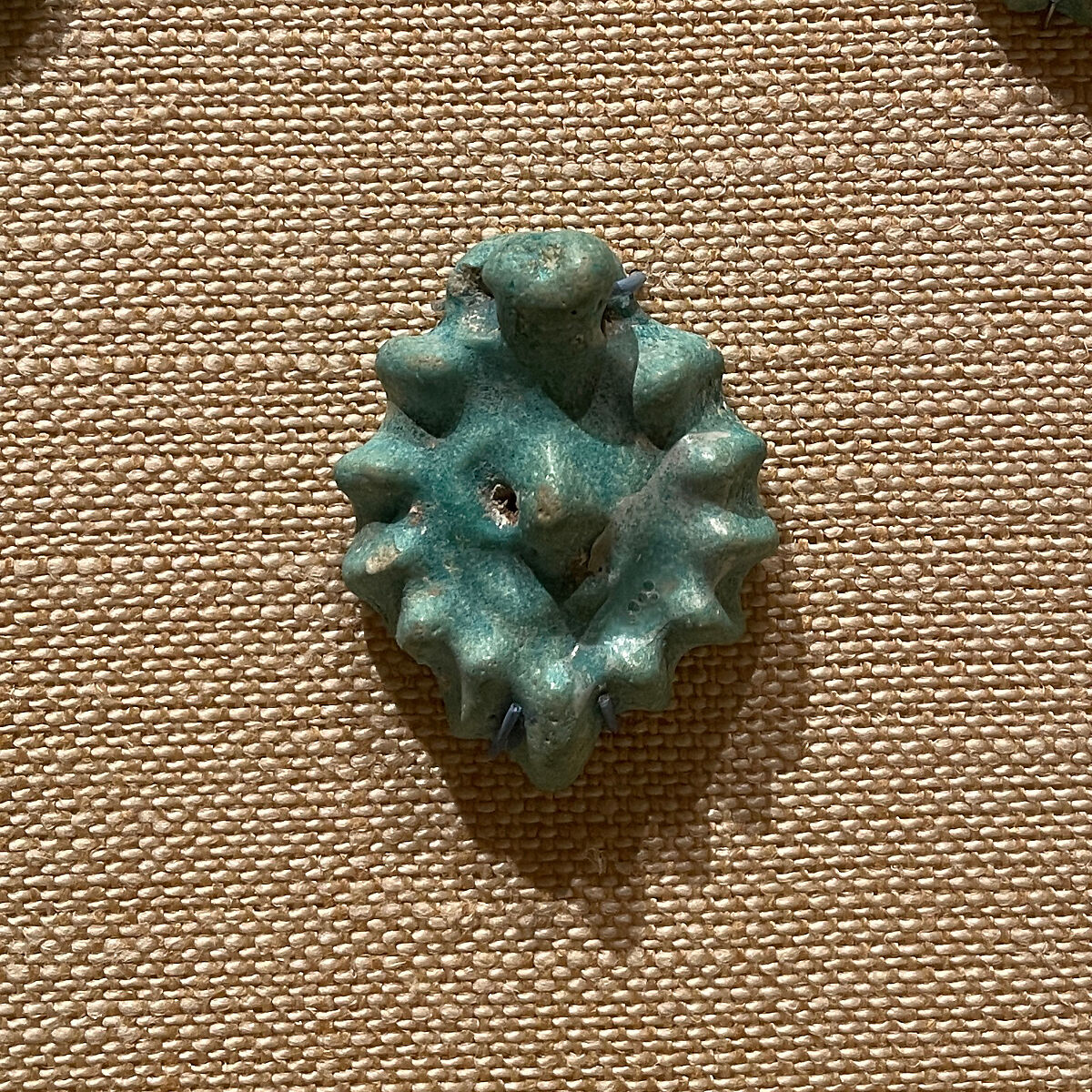 Pendant, Earthenware; molded under turquoise glaze 