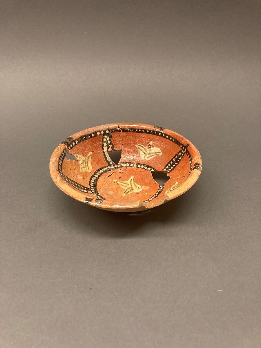 Bowl, Earthenware; red slip with polychrome slip decoration under glaze