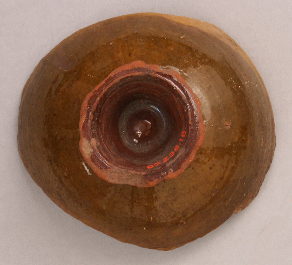 Fragment of a Bowl, Earthenware; slip-painted under transparent glaze