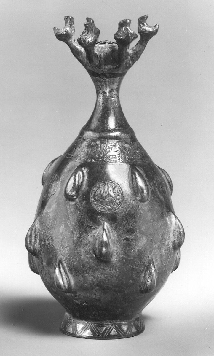 Bottle with Sprinkler Top, Quaternary alloy; cast, engraved, inlaid with silver and copper
