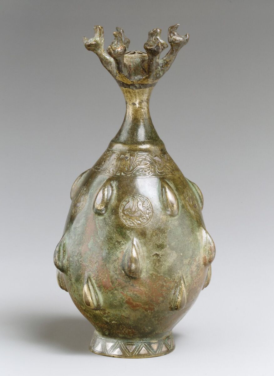 Bottle with Sprinkler Top, Quaternary alloy; cast, engraved, inlaid with silver and copper