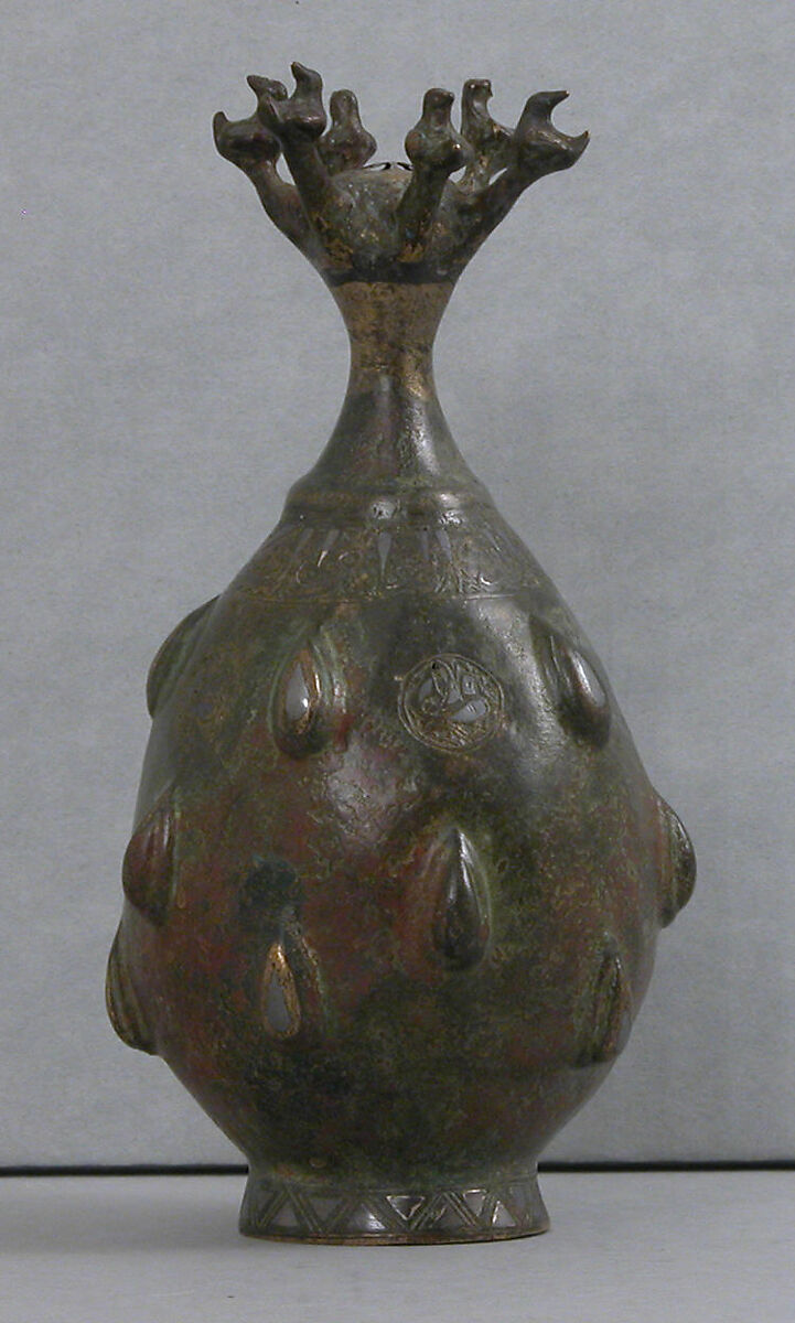 Bottle with Sprinkler Top, Quaternary alloy; cast, engraved, inlaid with silver and copper