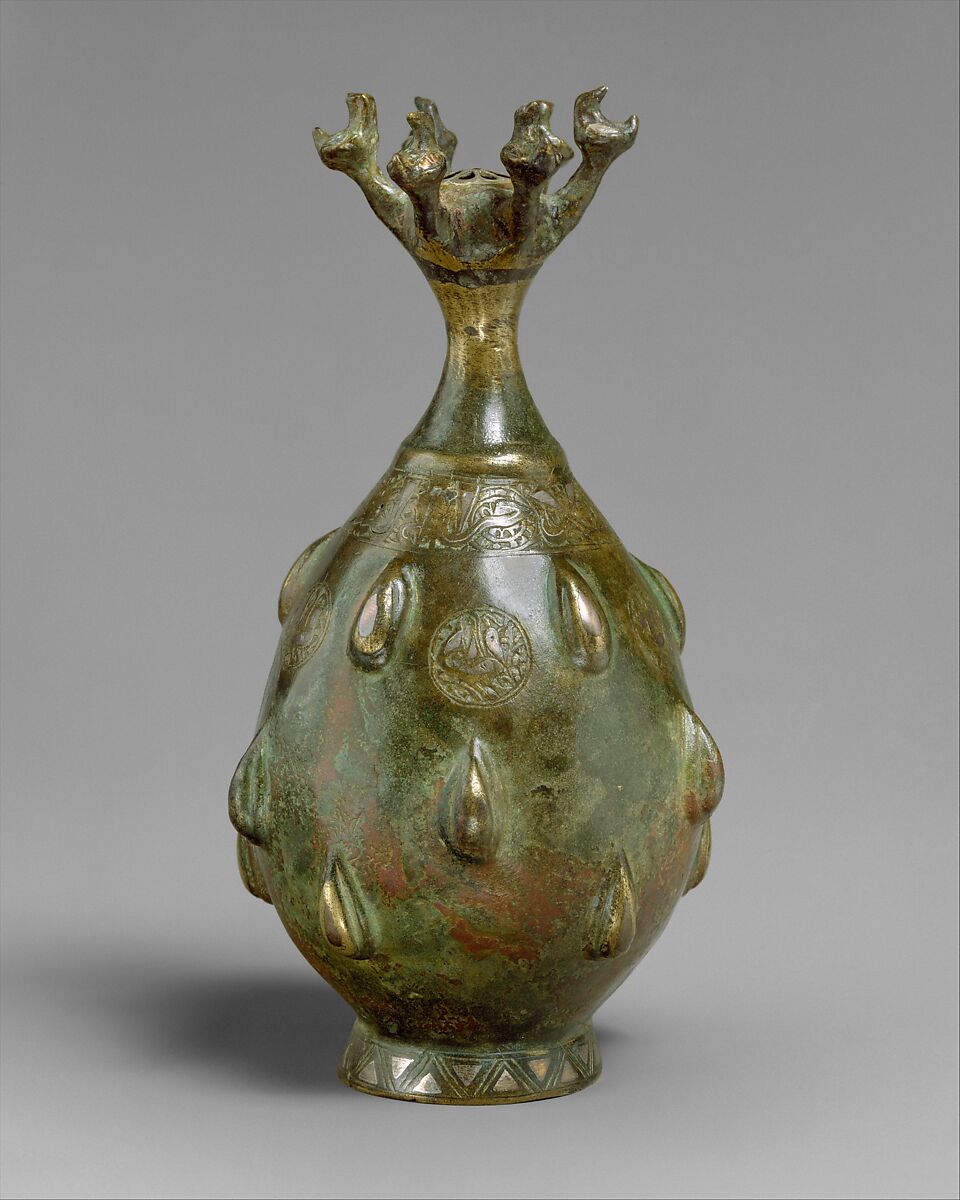 Bottle with Sprinkler Top, Quaternary alloy; cast, engraved, inlaid with silver and copper