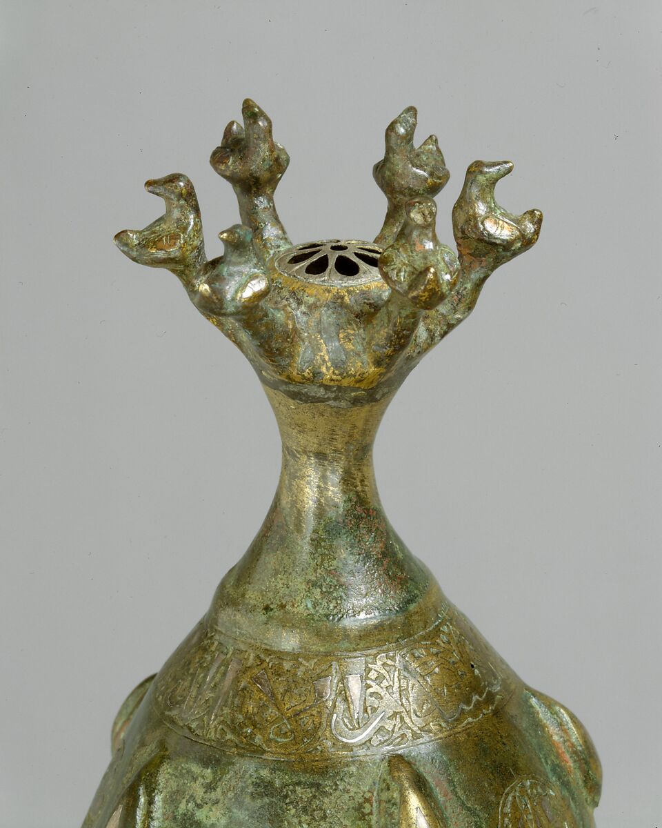 Bottle with Sprinkler Top, Quaternary alloy; cast, engraved, inlaid with silver and copper