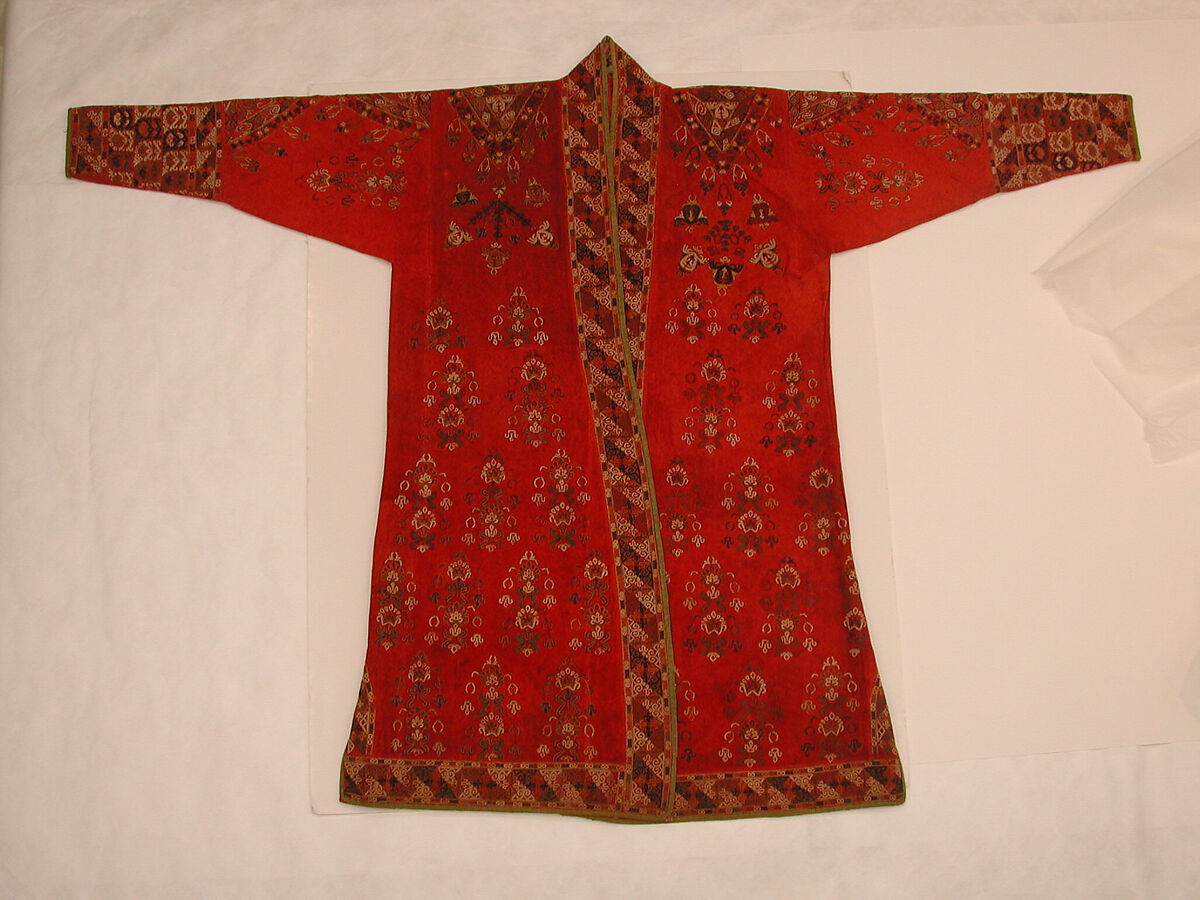 Coat (Choga), Ground fabric: hand-spun red plain-weave wool (warp and weft); embroidery: silk; facing: ikat silk (warp), cotton (weft); lining: roller-printed Russian cotton
