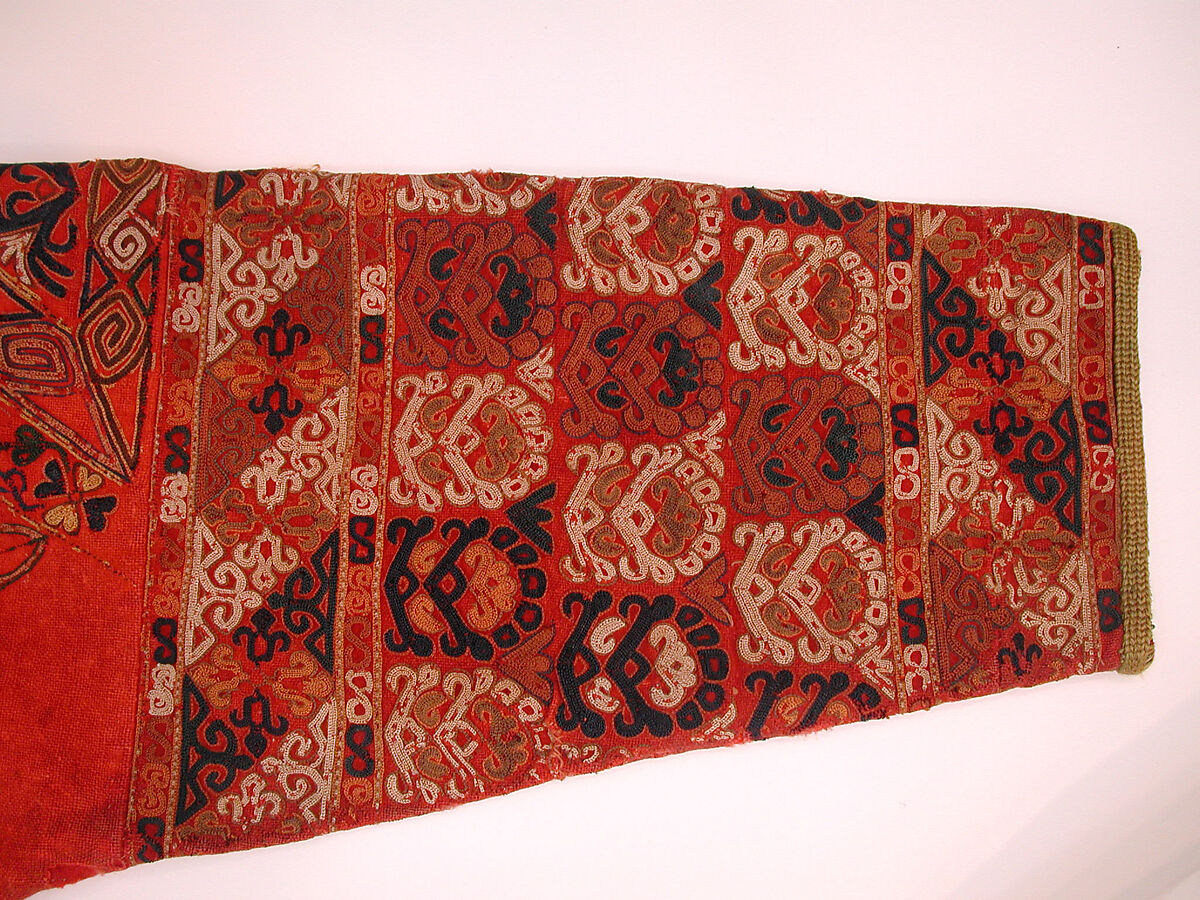 Coat (Choga), Ground fabric: hand-spun red plain-weave wool (warp and weft); embroidery: silk; facing: ikat silk (warp), cotton (weft); lining: roller-printed Russian cotton