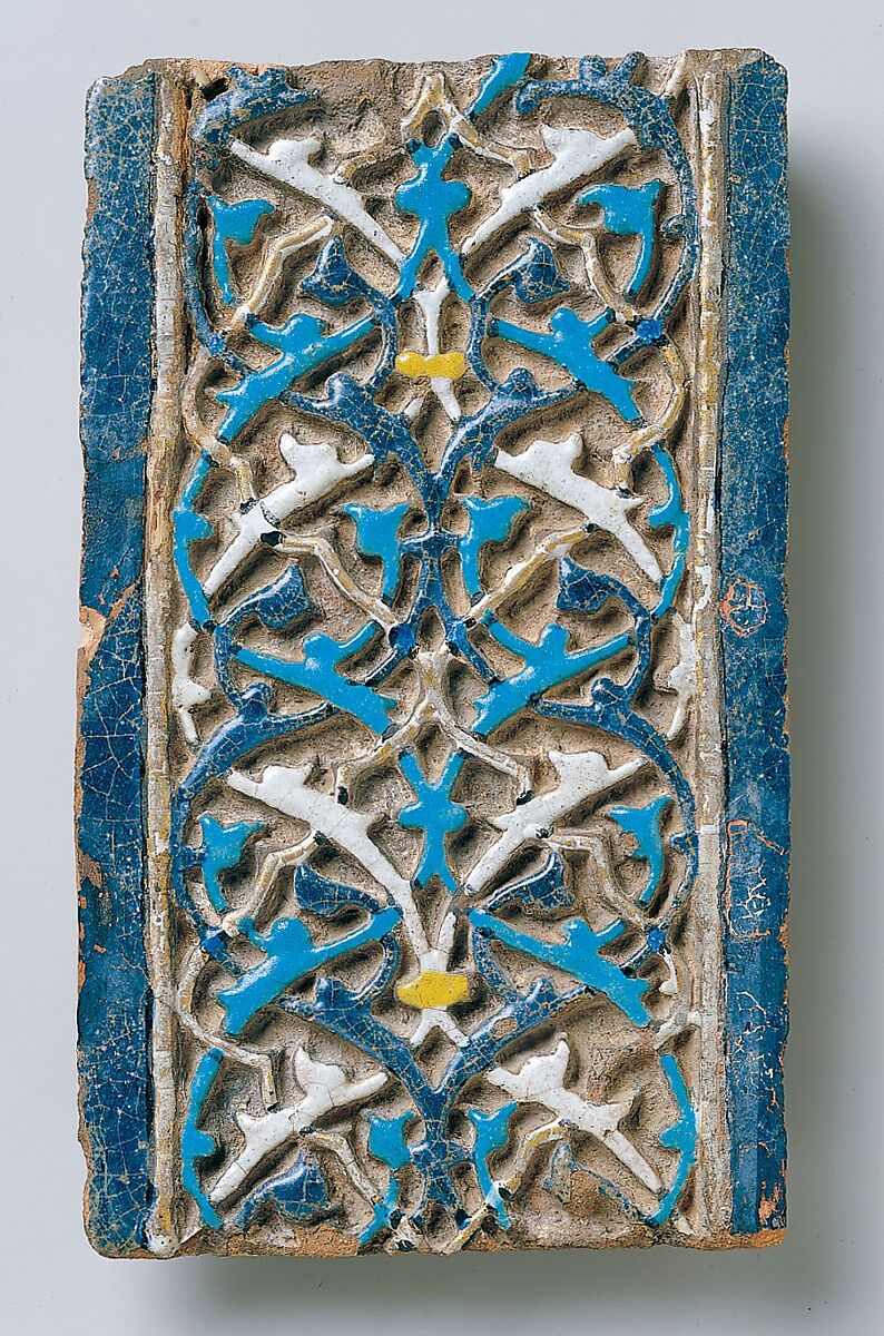 Tile, Tempered earthenware; molded; polychrome glazed within black wax resist outlines (cuerda seca technique); gilded