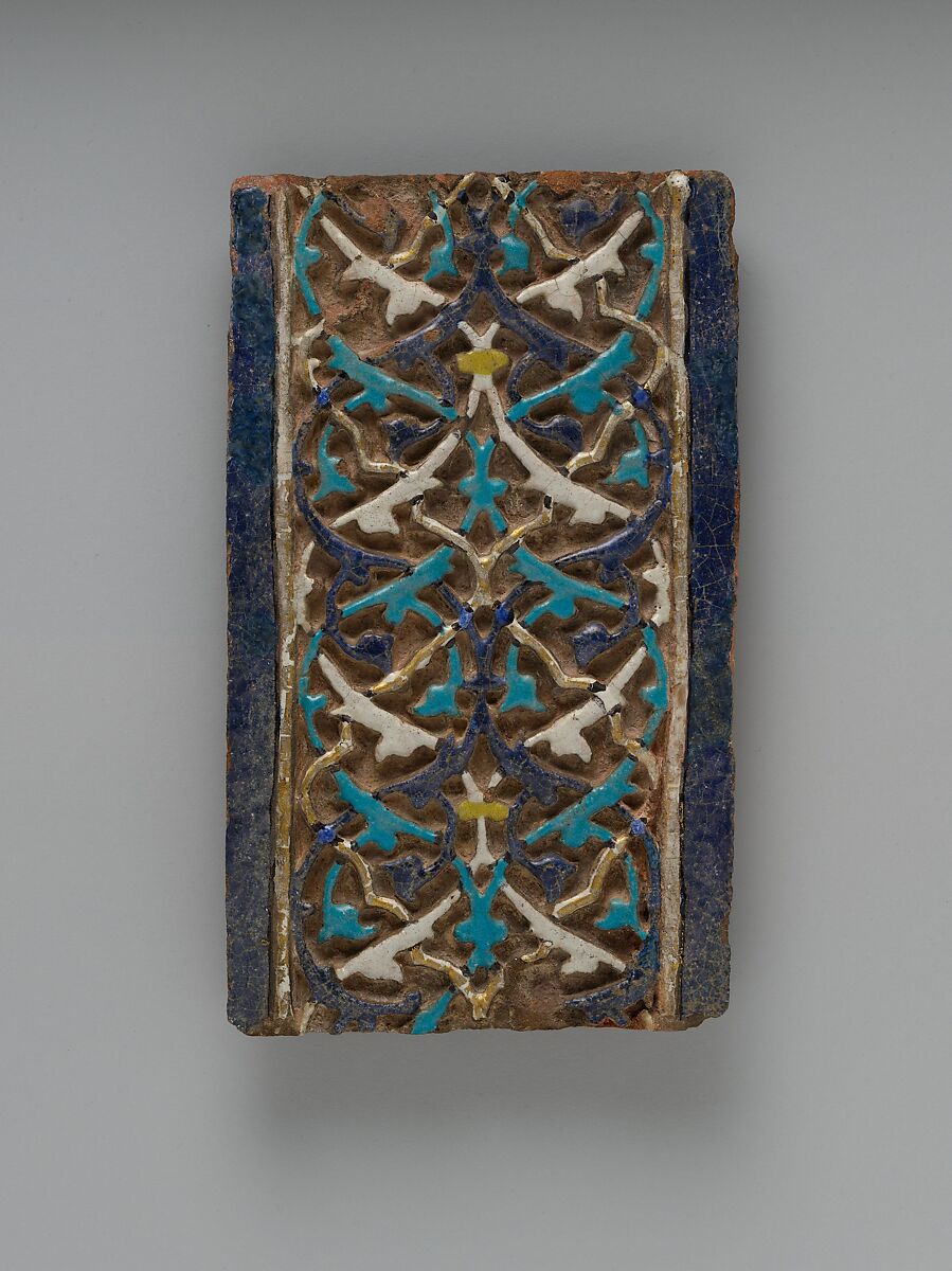 Tile, Tempered earthenware; molded; polychrome glazed within black wax resist outlines (cuerda seca technique); gilded