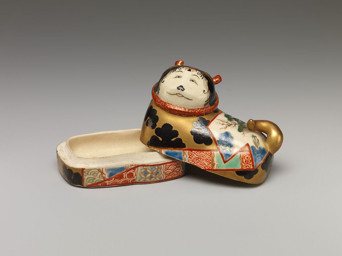 One of a Pair of Incense Boxes in the Shape of Dog Charms, Porcelain with overglaze enamels (Minpei kilns), Japan