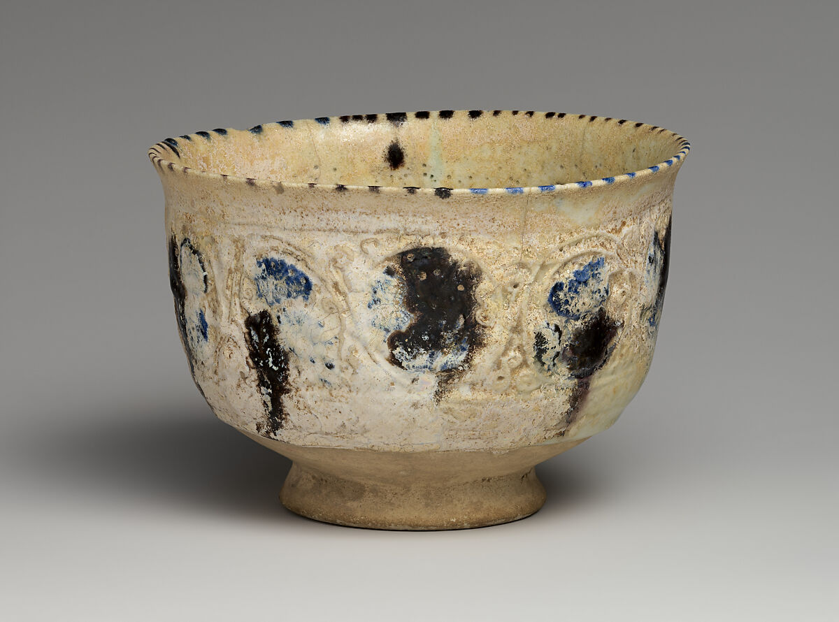 Bowl with Revolving Scrolls, Stonepaste; molded, pierced, incised, painted, and glazed