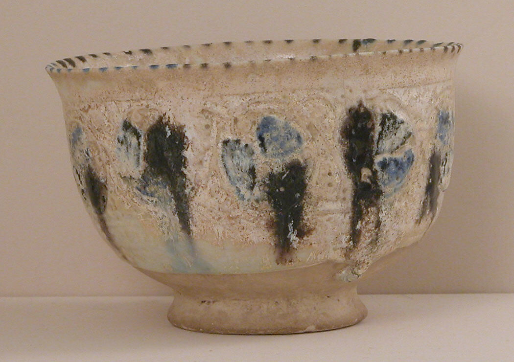 Bowl with Revolving Scrolls, Stonepaste; molded, pierced, incised, painted, and glazed