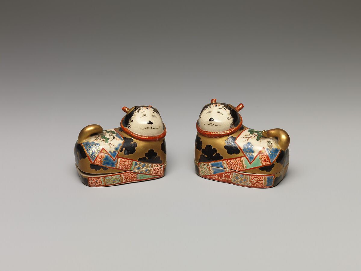One of a Pair of Incense Boxes in the Shape of Dog Charms, Porcelain with overglaze enamels (Minpei kilns), Japan