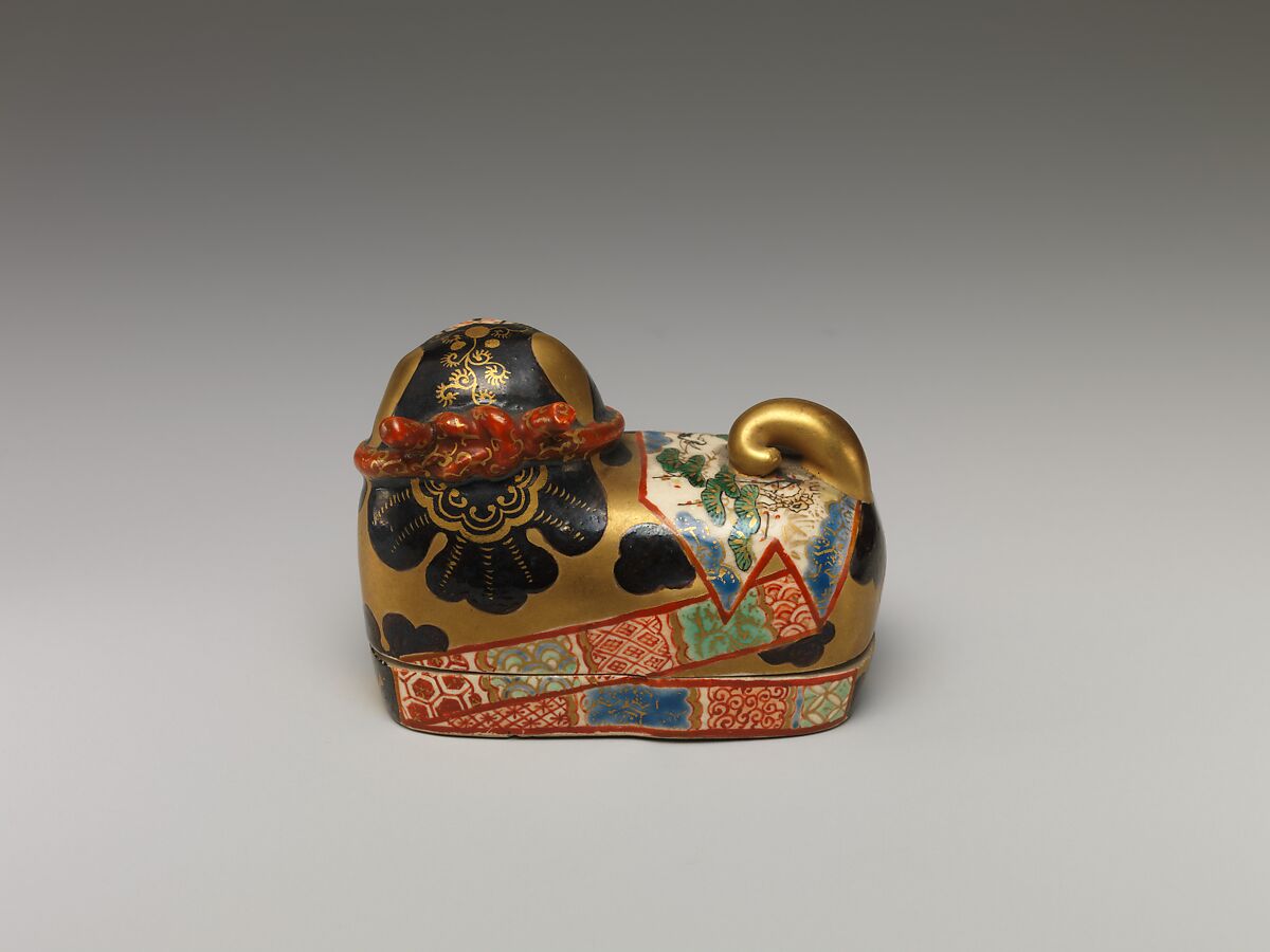 One of a Pair of Incense Boxes in the Shape of Dog Charms, Porcelain with overglaze enamels (Minpei kilns), Japan