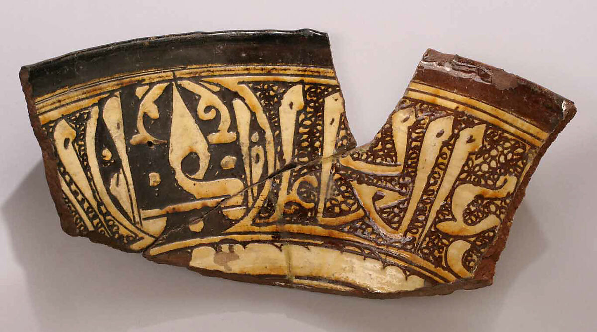 Fragment, Earthenware; incised decoration through white slip under transparent glaze 