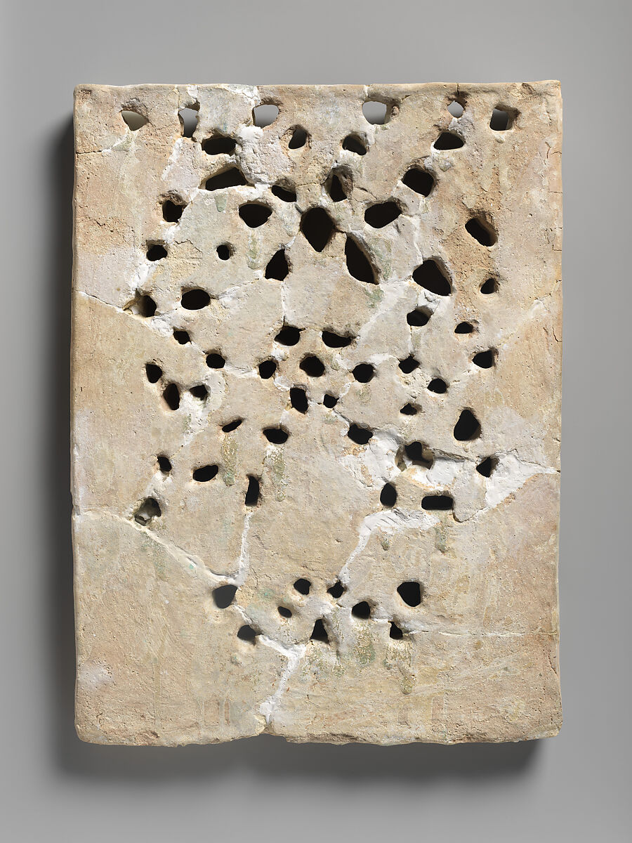 Pierced Screen with Letters against a Vegetal Pattern (and Additional Fragments of a Screen), Stonepaste; painted and glazed