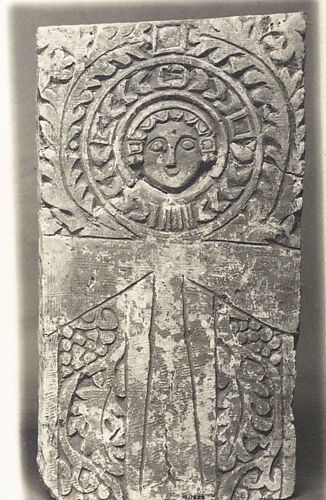 Funerary Stele with Ankh (Looped Cross) Featuring a Human Face at the Center