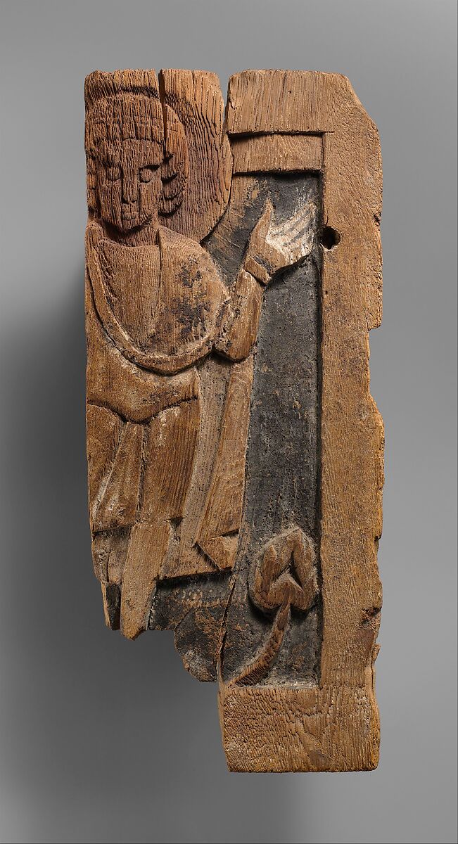 Fragmentary Carved Panel with a Saint, Wood; carved, originally painted 
