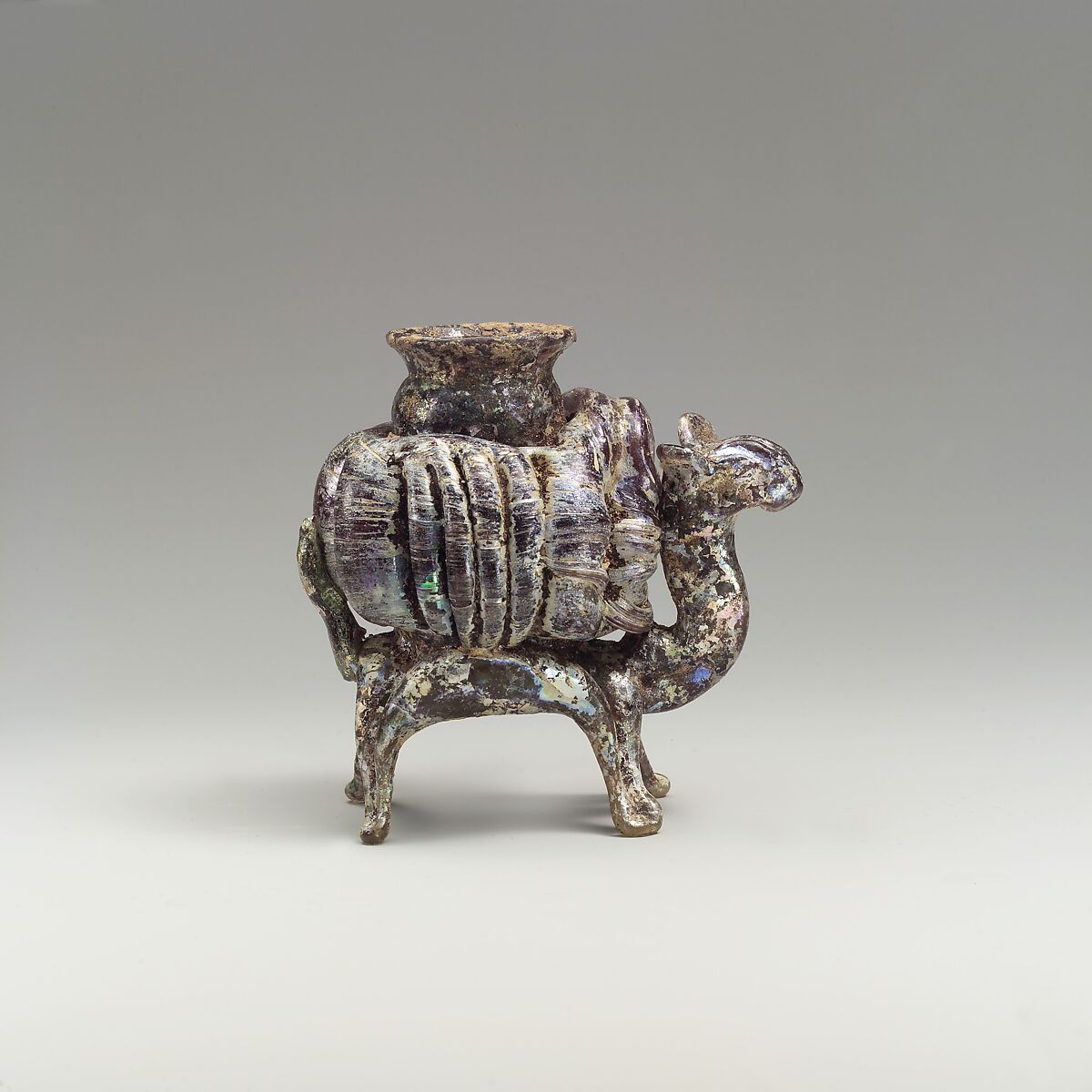 Animal flask, Glass, yellowish and pinkish; blown, applied decoration