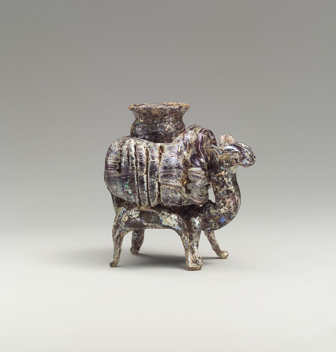 Animal flask, Glass, yellowish and pinkish; blown, applied decoration