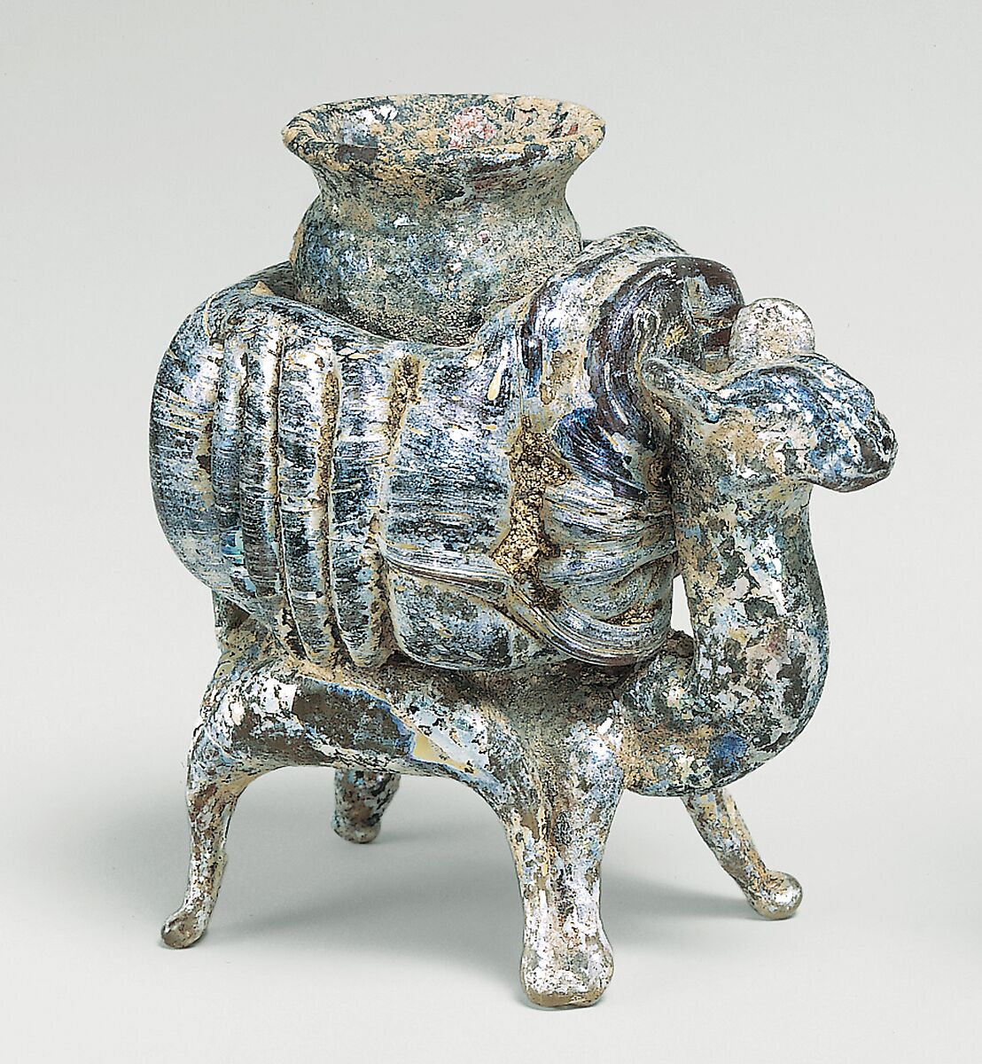 Animal flask, Glass, yellowish and pinkish; blown, applied decoration