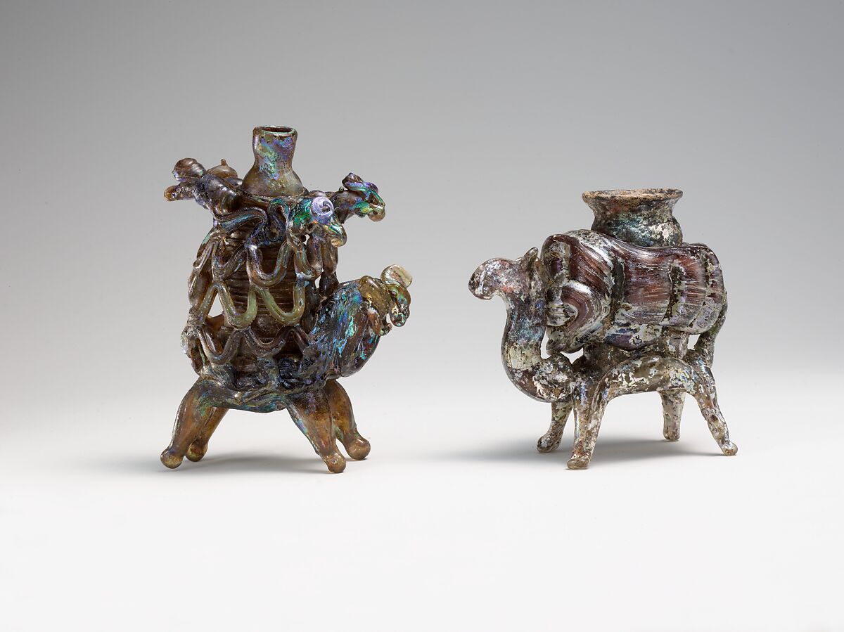 Animal flask, Glass, yellowish and pinkish; blown, applied decoration