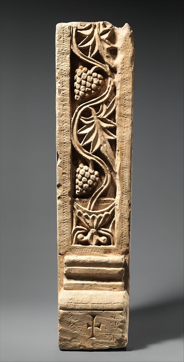 Door Post with Grapevine Emerging from a Chalice and a Small Cross, Limestone; carved in relief 