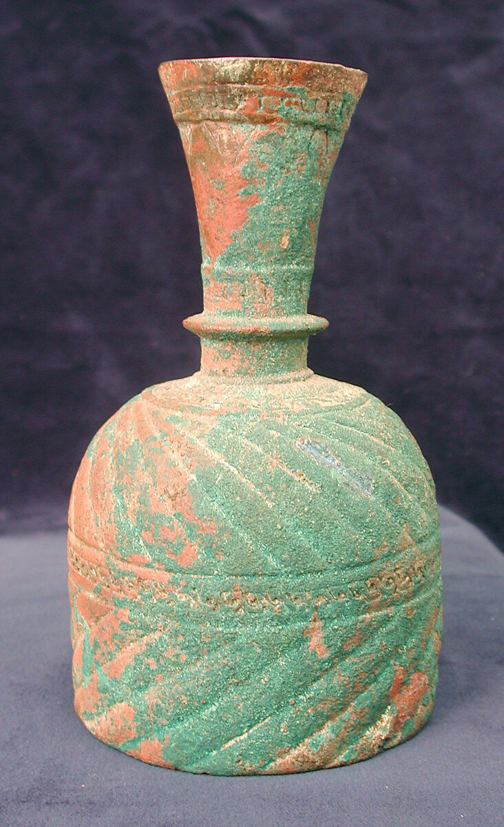 Bottle with Ribbed Design, Brass; cast, chased, inlaid with black compound 