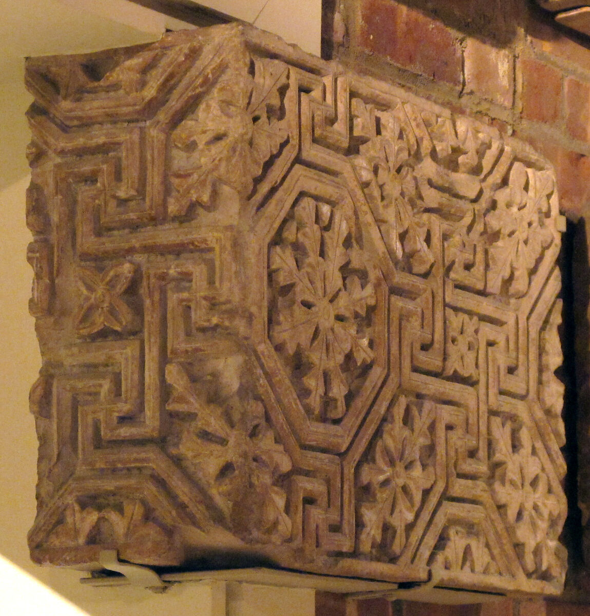 Corner Block from a Frieze with a Meander Pattern of Lines and Rosettes, Limestone; carved in relief