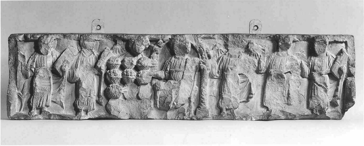 Fragment of a Frieze with the Miracle of Loaves and Fishes, Limestone; carved