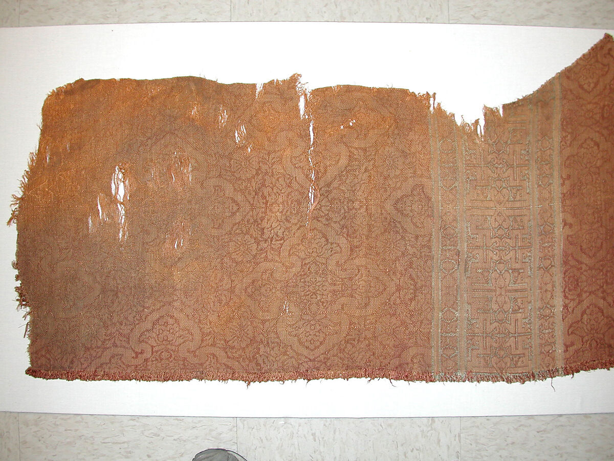 Textile Fragment, Brown or dark red, yellow (?), and blue silk and gilt metallic thread.  Samit (1/3 twill)