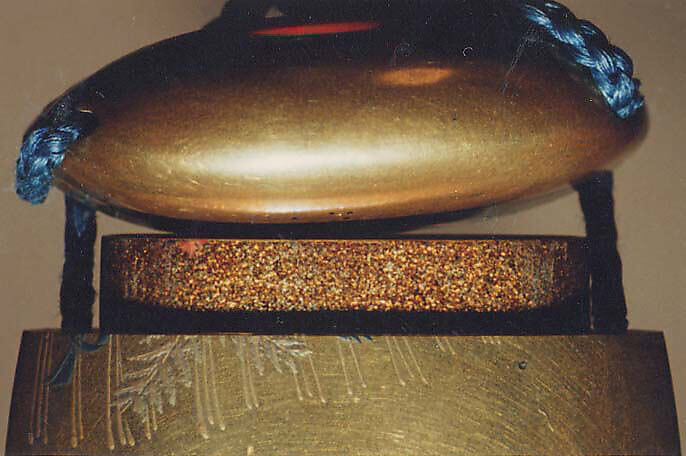 Case (Inrō) with Design of Ebisu and Daikoku Dancing beneath New Year's Decorations, Nikkōsai, Gold lacquer with gold and colored hiramkie sprinkled and polished lacquer and ivory inlay; Netsuke: polished wood button; Ojime: red lacquer bead; Interior: nashiji and fundame, Japan