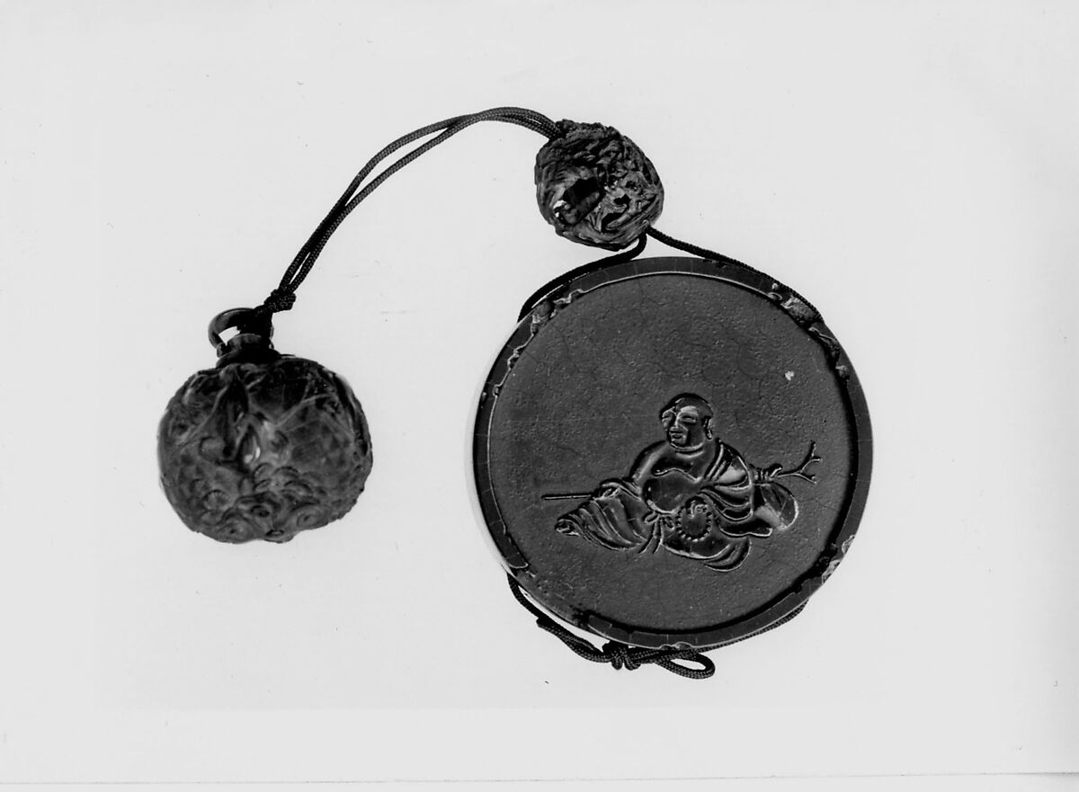 Case (Inrō) in the Shape of an Ink Stick with Design of Hotei (Putai) (obverse); Musical Instruments (reverse), Attributed to Shibata Zeshin (Japanese, 1807–1891), Roiro ('waxen') lacquer with black hiramakie sprinkled and polished lacquer and takamakie sprinkled and polished lacquer relief; Interior: roiro; Netsuke: nut carved with Chinese sages and attendants; Ojime: carved peach stone with landscape and figures, Japan