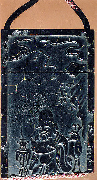 Case (Inrō) in the Shape of an Ink Stick with Design of God of Longevity (Jurōjin), Reading beneath a Star Constellation (obverse);Twelve-Character Inscription (reverse), Shibata Zeshin (Japanese, 1807–1891), Roiro (waxen) lacquer with black hiramakie sprinkled and polished lacquer and takamakie sprinkled and polished lacquer relief; Interior: roiro; Netsuke: lacquer in shape of a worn ink stick; Ojime: black lacquer bead, Japan