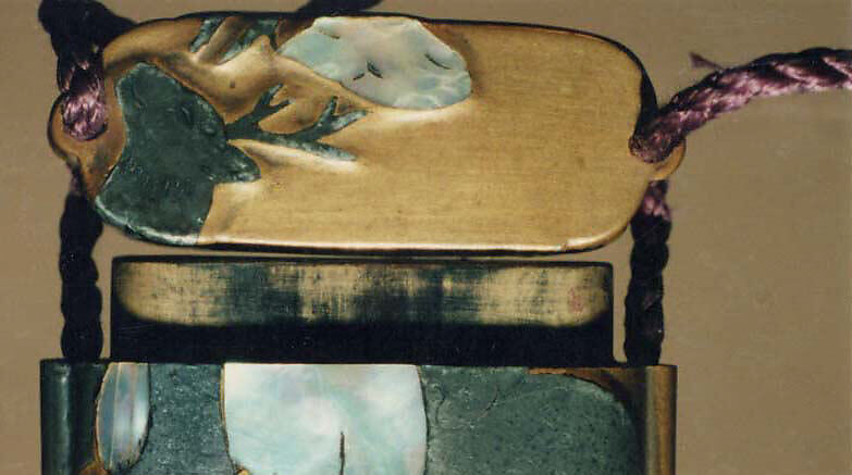 Case (Inrō) with Design of Standing Deer, After Ogata Kōrin (Japanese, 1658–1716), Gold lacquer with mother-of-pearl and pewter inlay
Ojime: carnelian bead
Netsuke: carved wood deer, Japan