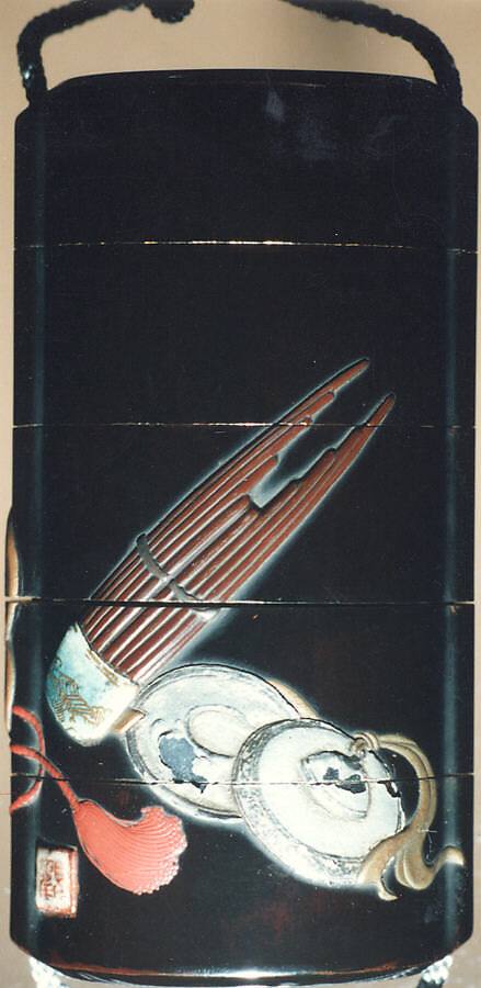 Case (Inrō) with Design of Bugaku Hat (obverseI; Shō Flute and Cymbals (reverse), Sprinkled gold lacquer with inlaid mother-of-pearl, pottery, and pewter; Interior: nashiji and fundame; Ojime: marble; Netsuke: wood with lacquer decoration of books, Japan