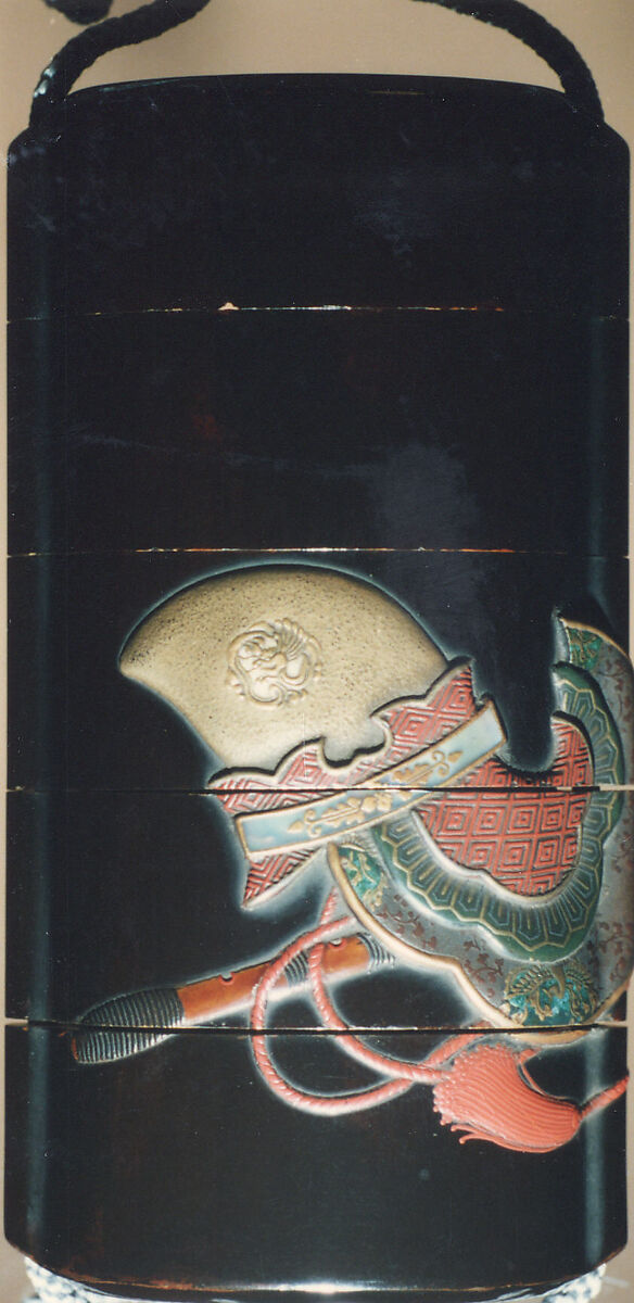 Case (Inrō) with Design of Bugaku Hat (obverseI; Shō Flute and Cymbals (reverse), Sprinkled gold lacquer with inlaid mother-of-pearl, pottery, and pewter; Interior: nashiji and fundame; Ojime: marble; Netsuke: wood with lacquer decoration of books, Japan